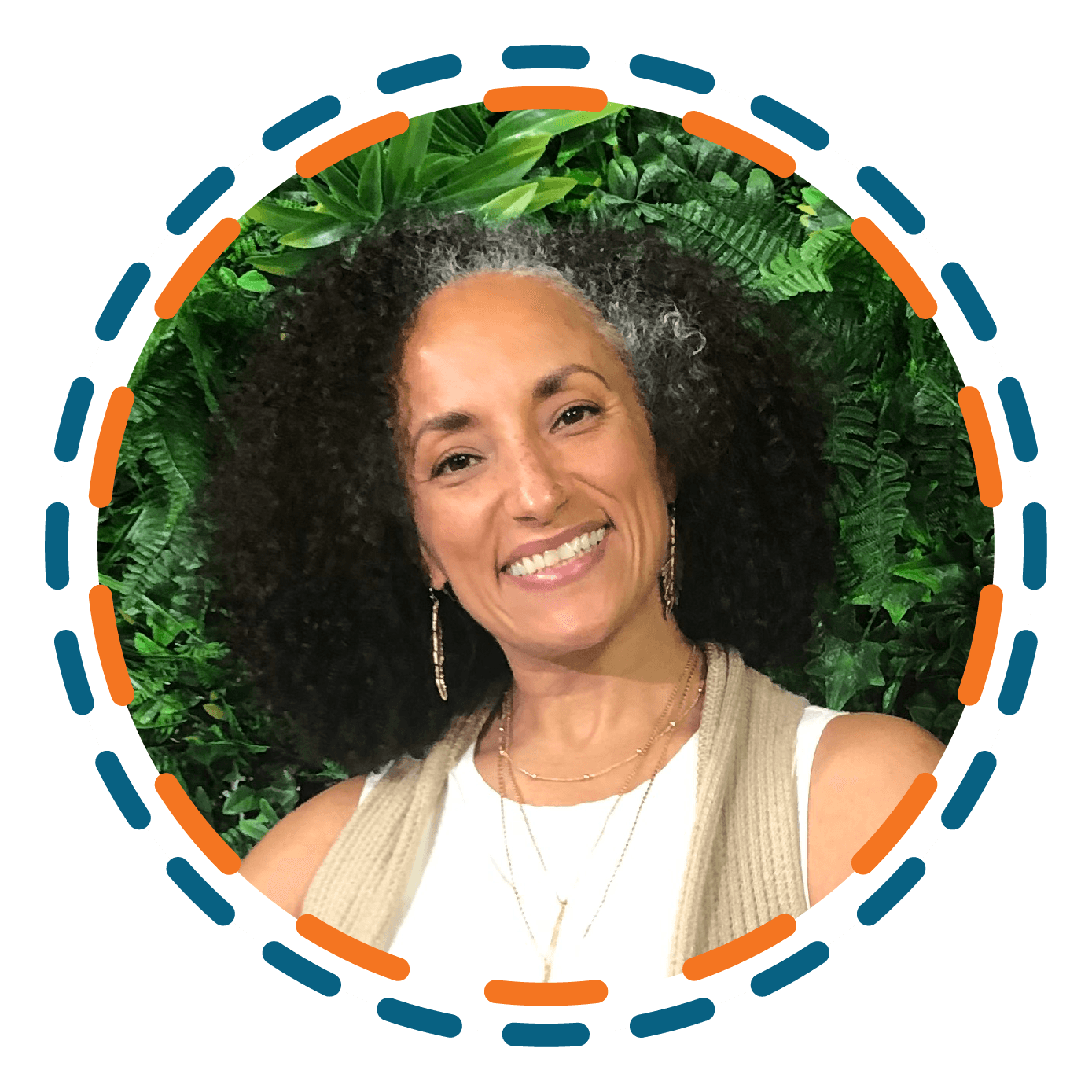 Headshot of Day 1 Keynote Speaker, Maria Milagros Vazquez, smiling, in front of greenery